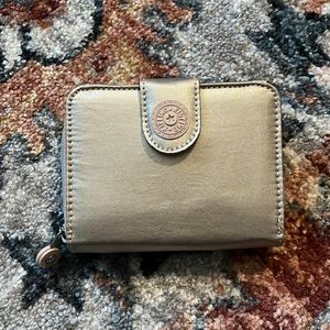 Like New Kipling snap and zip wallet in Toasty Gold